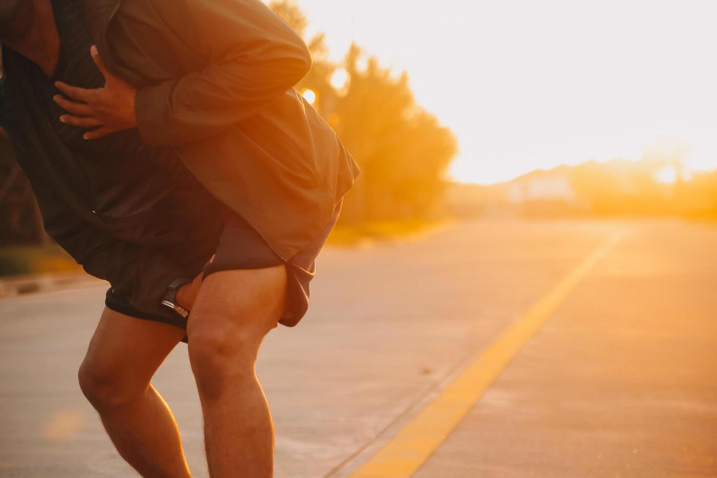 Athlete runner feet running on road,Jogging concept at outdoors. Man running for exercise.Athlete runner feet running on road, Jogging concept at outdoors. Man running for exercise. photo