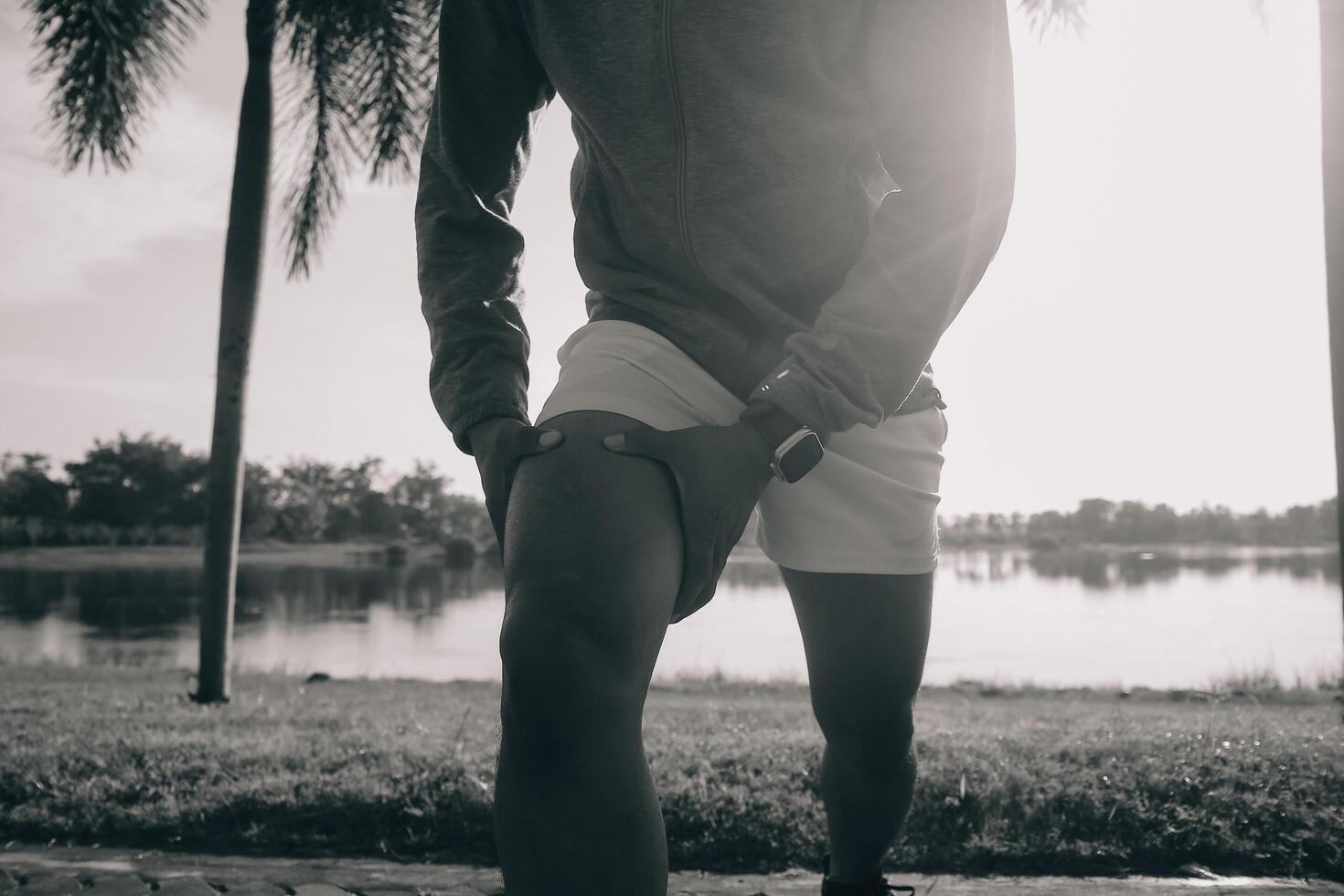 Athlete runner feet running on road,Jogging concept at outdoors. Man running for exercise.Athlete runner feet running on road, Jogging concept at outdoors. Man running for exercise. photo