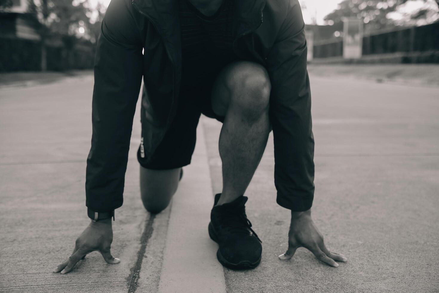 Athlete runner feet running on road,Jogging concept at outdoors. Man running for exercise.Athlete runner feet running on road, Jogging concept at outdoors. Man running for exercise. photo