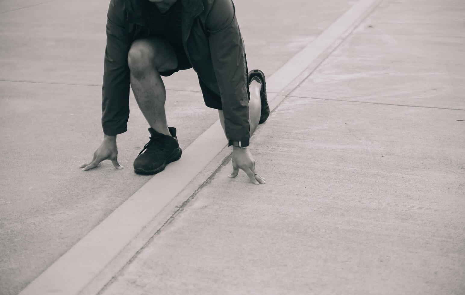 Athlete runner feet running on road,Jogging concept at outdoors. Man running for exercise.Athlete runner feet running on road, Jogging concept at outdoors. Man running for exercise. photo