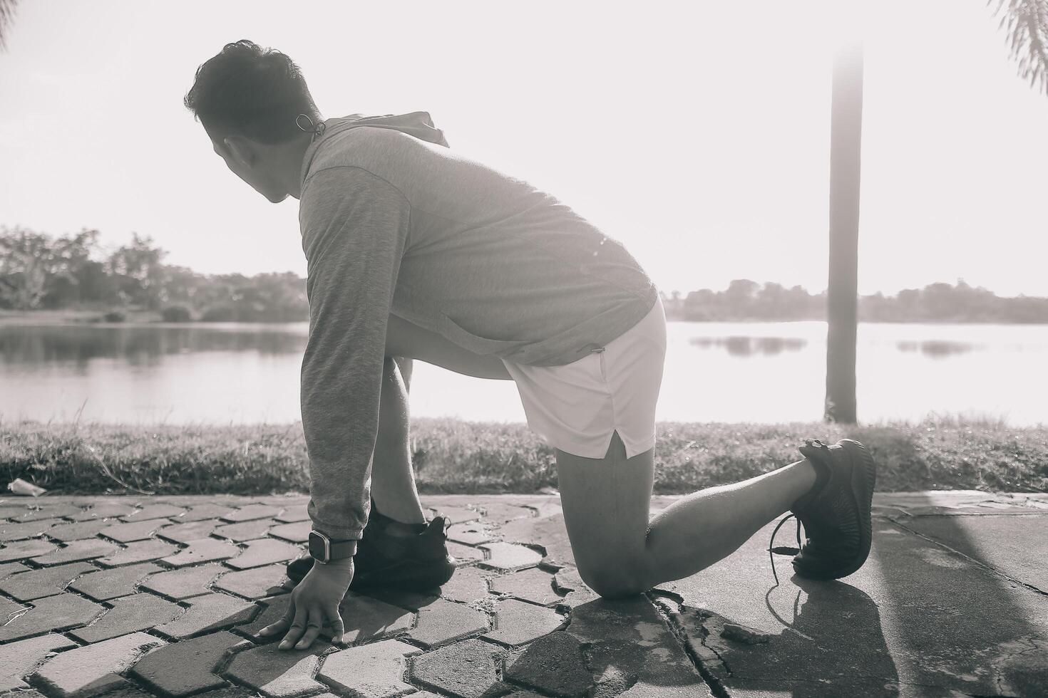 Athlete runner feet running on road,Jogging concept at outdoors. Man running for exercise.Athlete runner feet running on road, Jogging concept at outdoors. Man running for exercise. photo