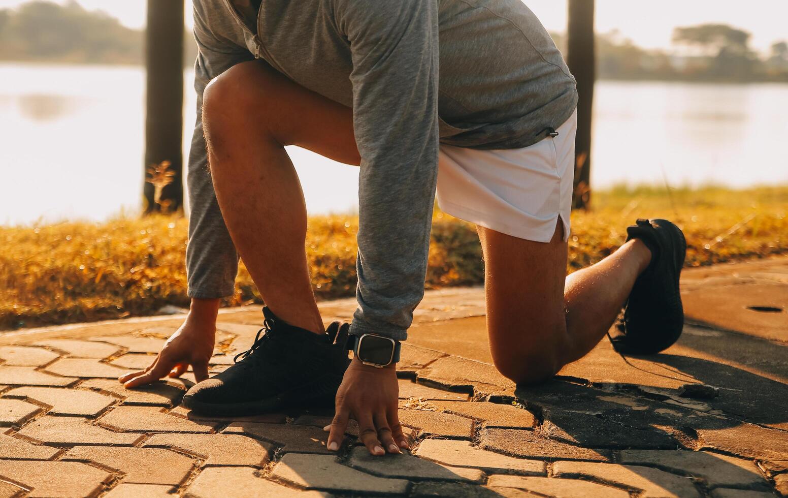 Athlete runner feet running on road,Jogging concept at outdoors. Man running for exercise.Athlete runner feet running on road, Jogging concept at outdoors. Man running for exercise. photo