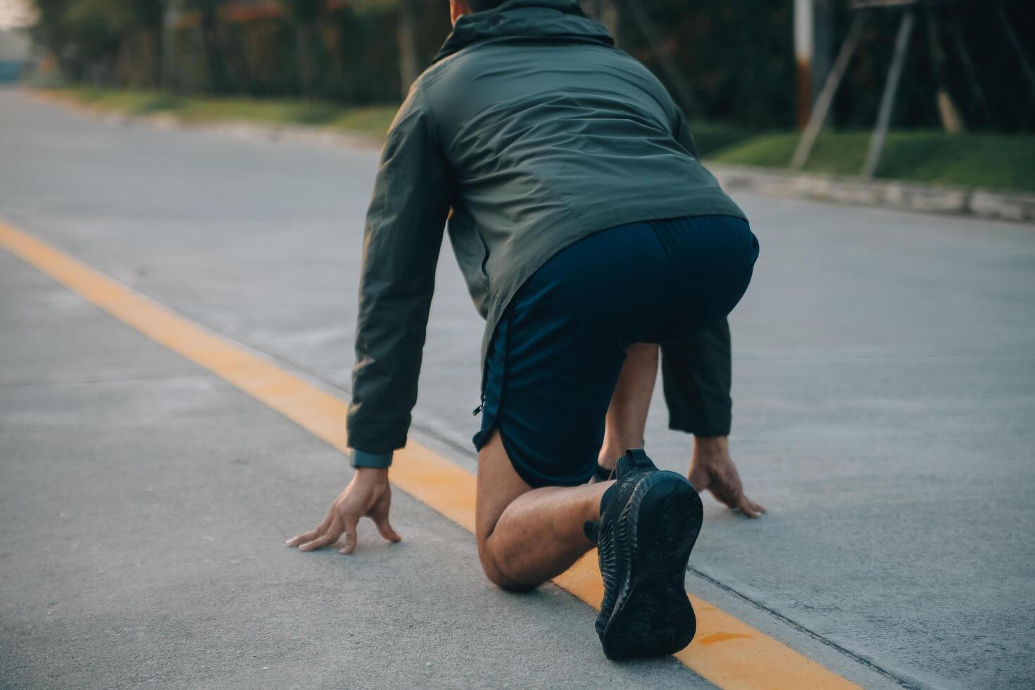 Athlete runner feet running on road,Jogging concept at outdoors. Man running for exercise.Athlete runner feet running on road, Jogging concept at outdoors. Man running for exercise. photo