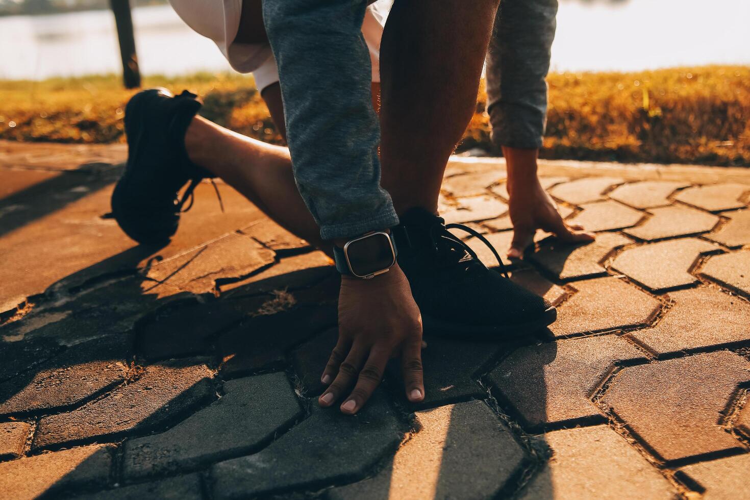 Athlete runner feet running on road,Jogging concept at outdoors. Man running for exercise.Athlete runner feet running on road, Jogging concept at outdoors. Man running for exercise. photo