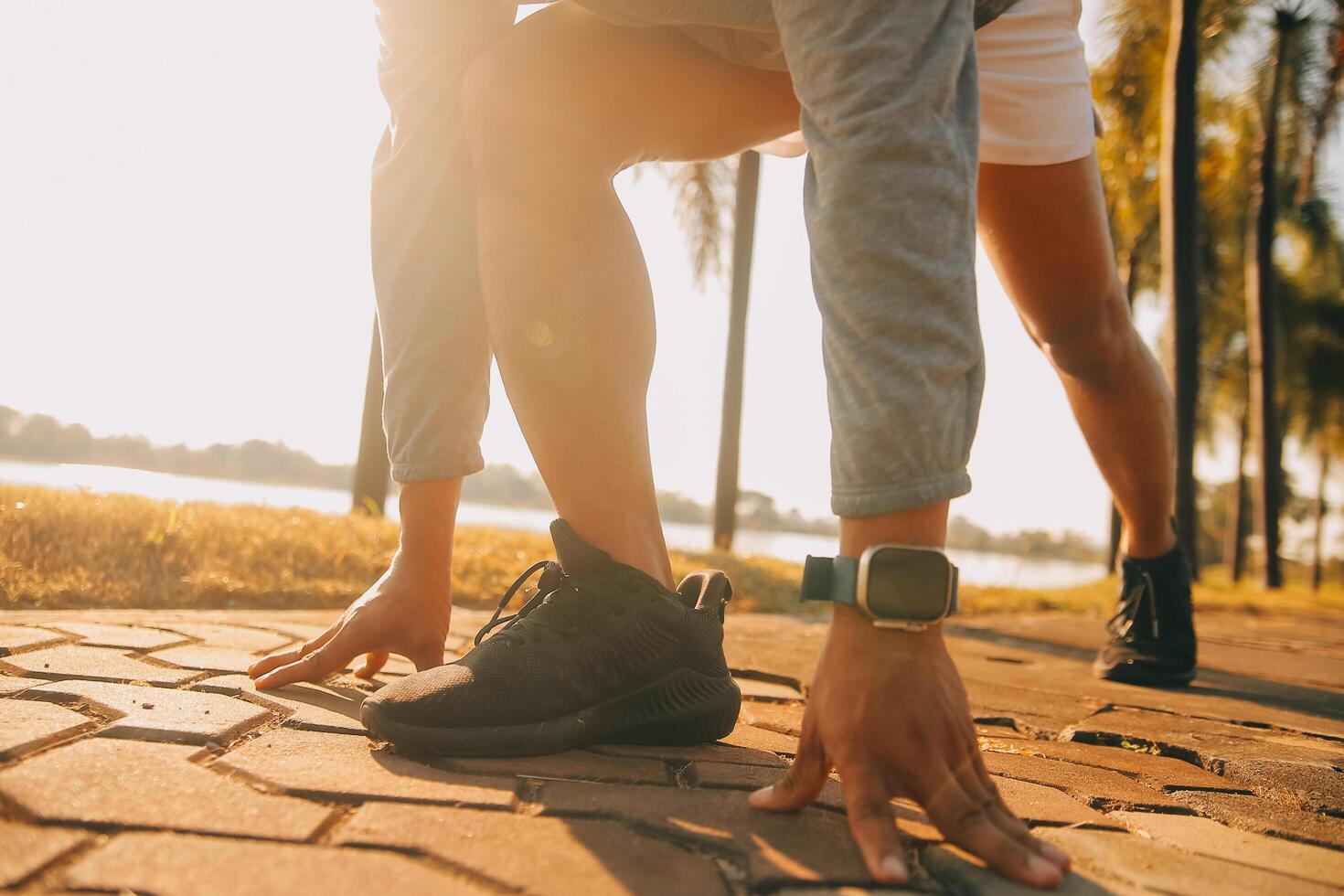 Athlete runner feet running on road,Jogging concept at outdoors. Man running for exercise.Athlete runner feet running on road, Jogging concept at outdoors. Man running for exercise. photo
