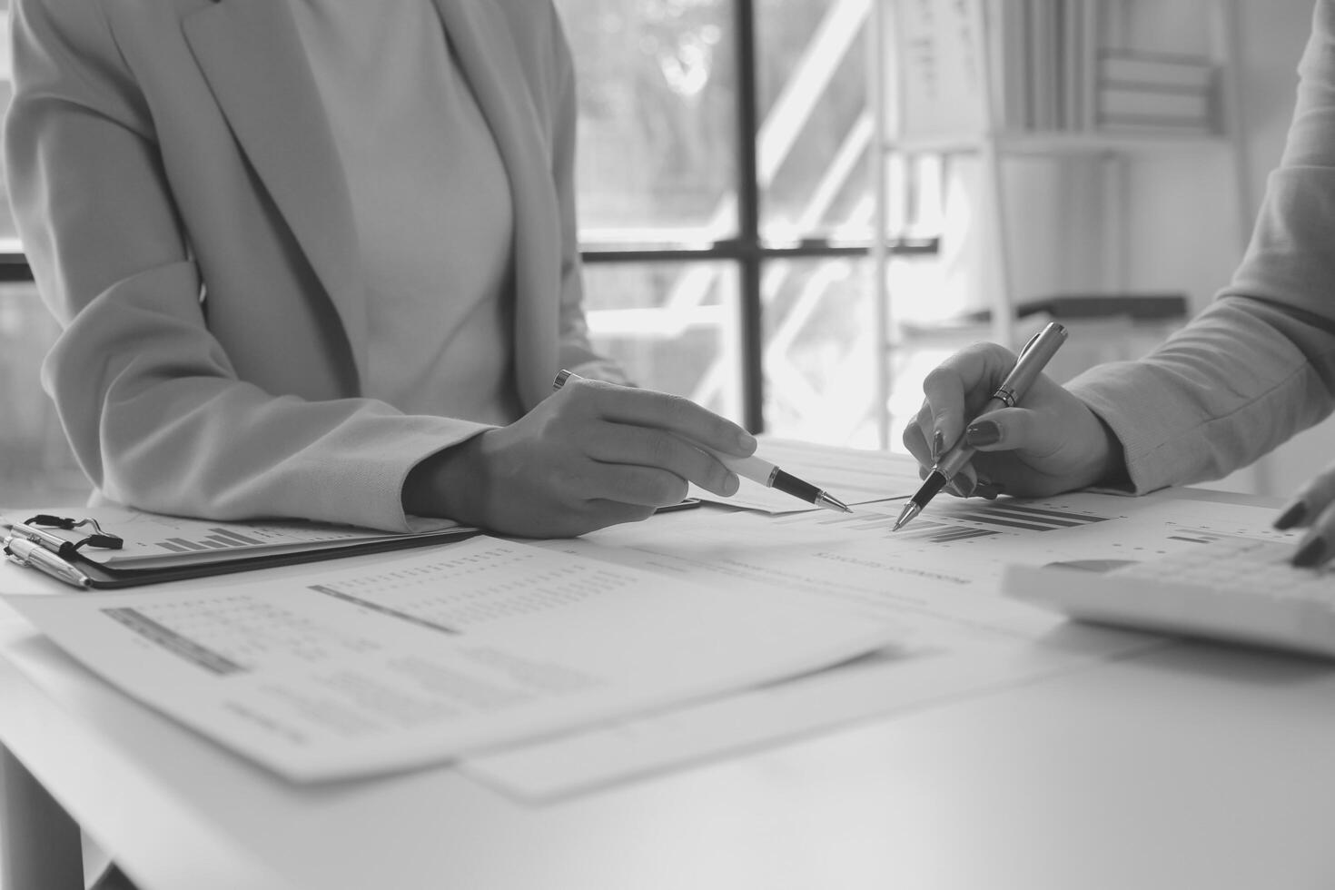 Team of business people working together in the meeting room office, teamwork background charts and graphs banner, double exposure successful teamwork,business planning concept. photo