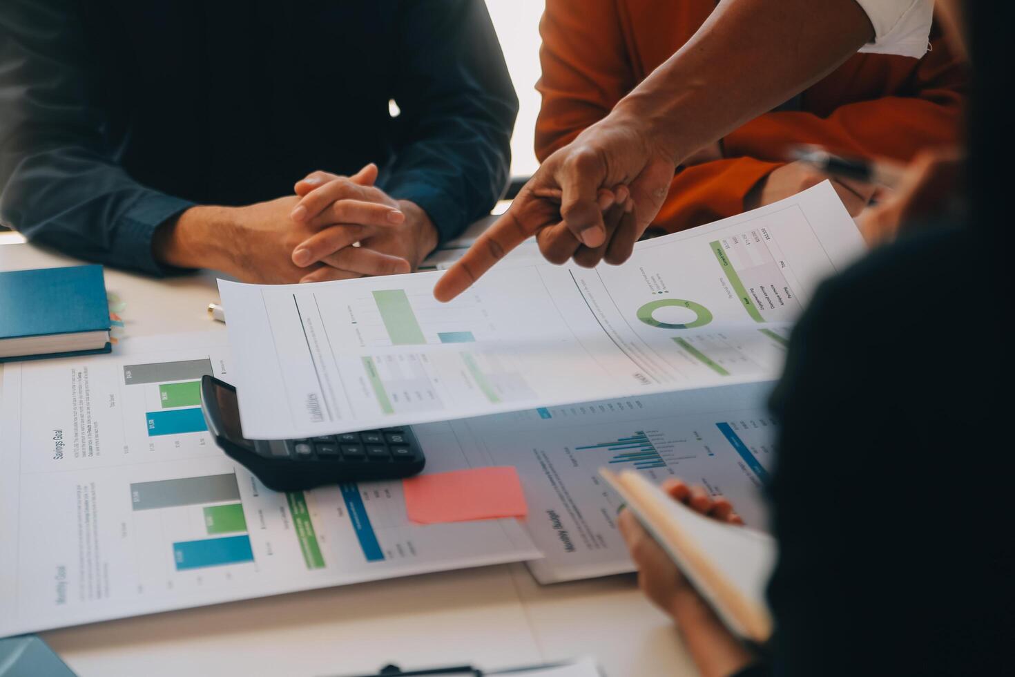 Co working conference, Business team meeting present, investor colleagues discussing new plan financial graph data on office table with laptop and digital tablet, Finance, accounting, investment. photo