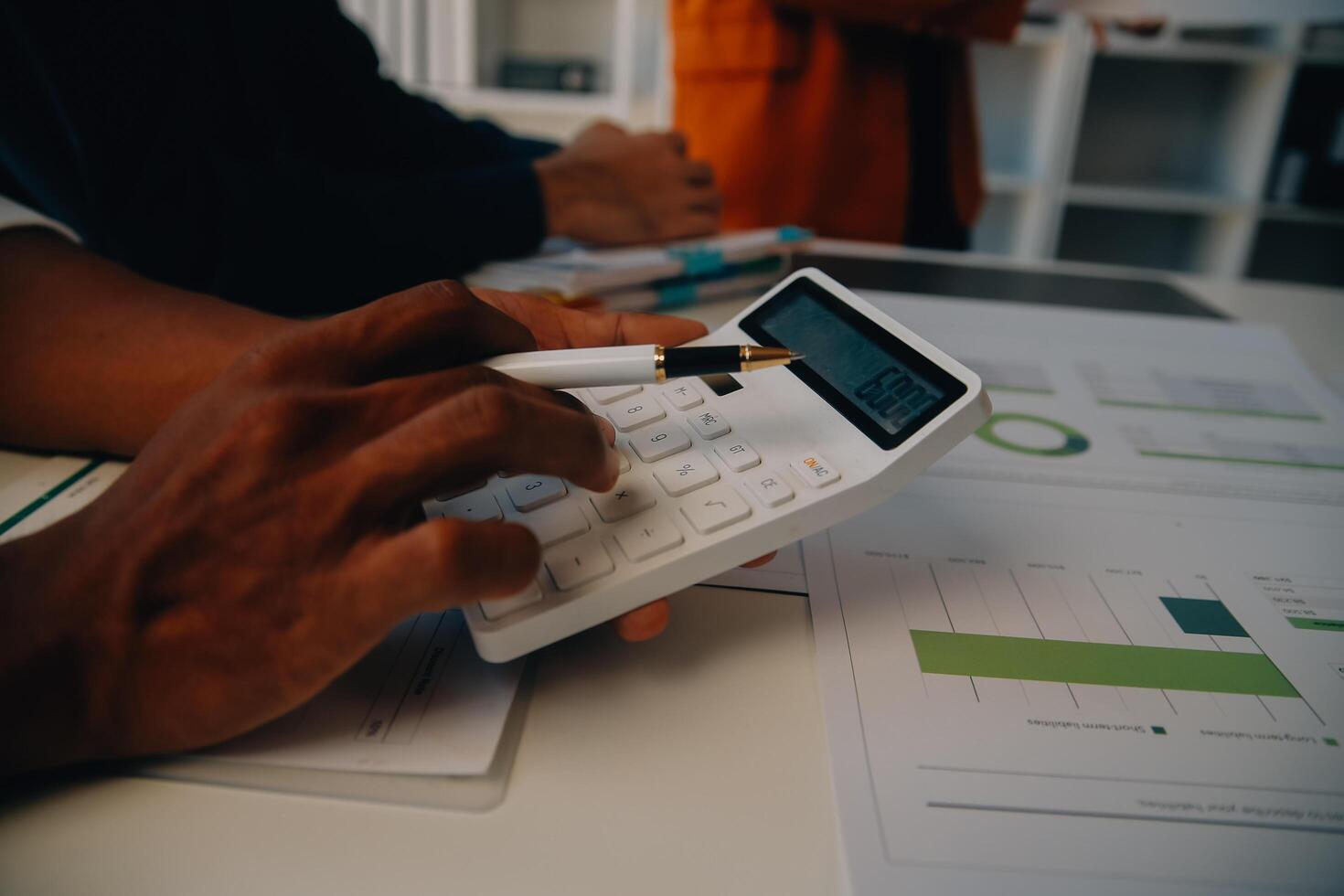 Co working conference, Business team meeting present, investor colleagues discussing new plan financial graph data on office table with laptop and digital tablet, Finance, accounting, investment. photo