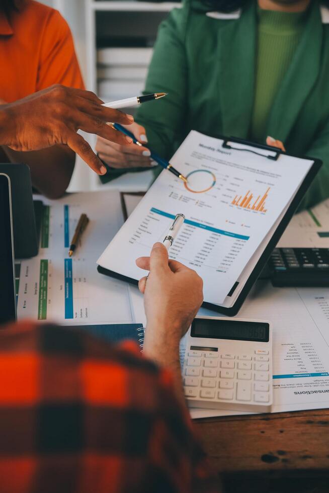 Co working conference, Business team meeting present, investor colleagues discussing new plan financial graph data on office table with laptop and digital tablet, Finance, accounting, investment. photo