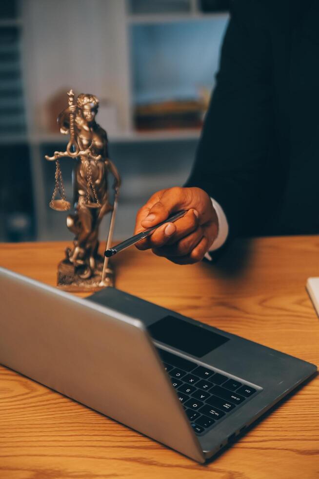 Judge gavel with Justice lawyers having team meeting at law firm background. Concepts of Law and Legal services. photo