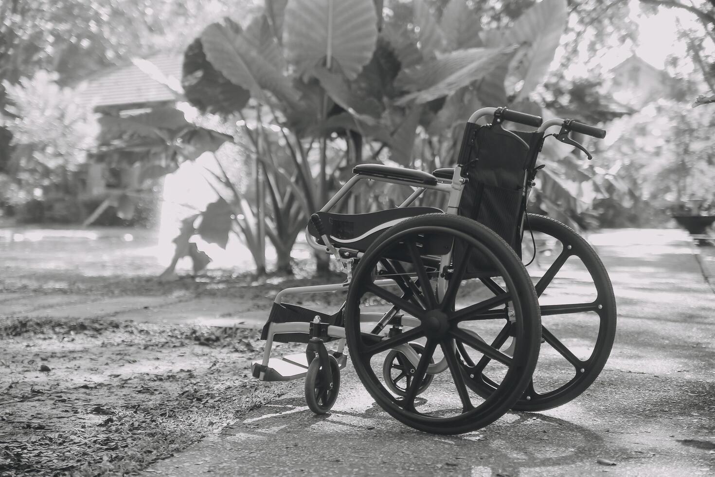 Single wheelchair parked in hospital hallway photo