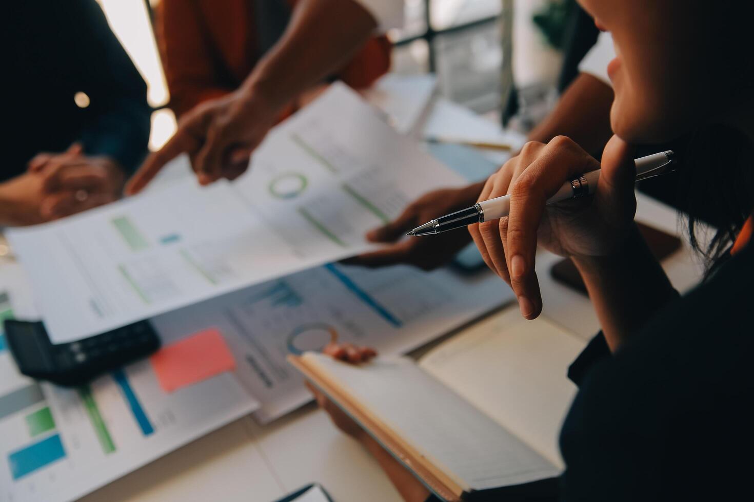 Co working conference, Business team meeting present, investor colleagues discussing new plan financial graph data on office table with laptop and digital tablet, Finance, accounting, investment. photo