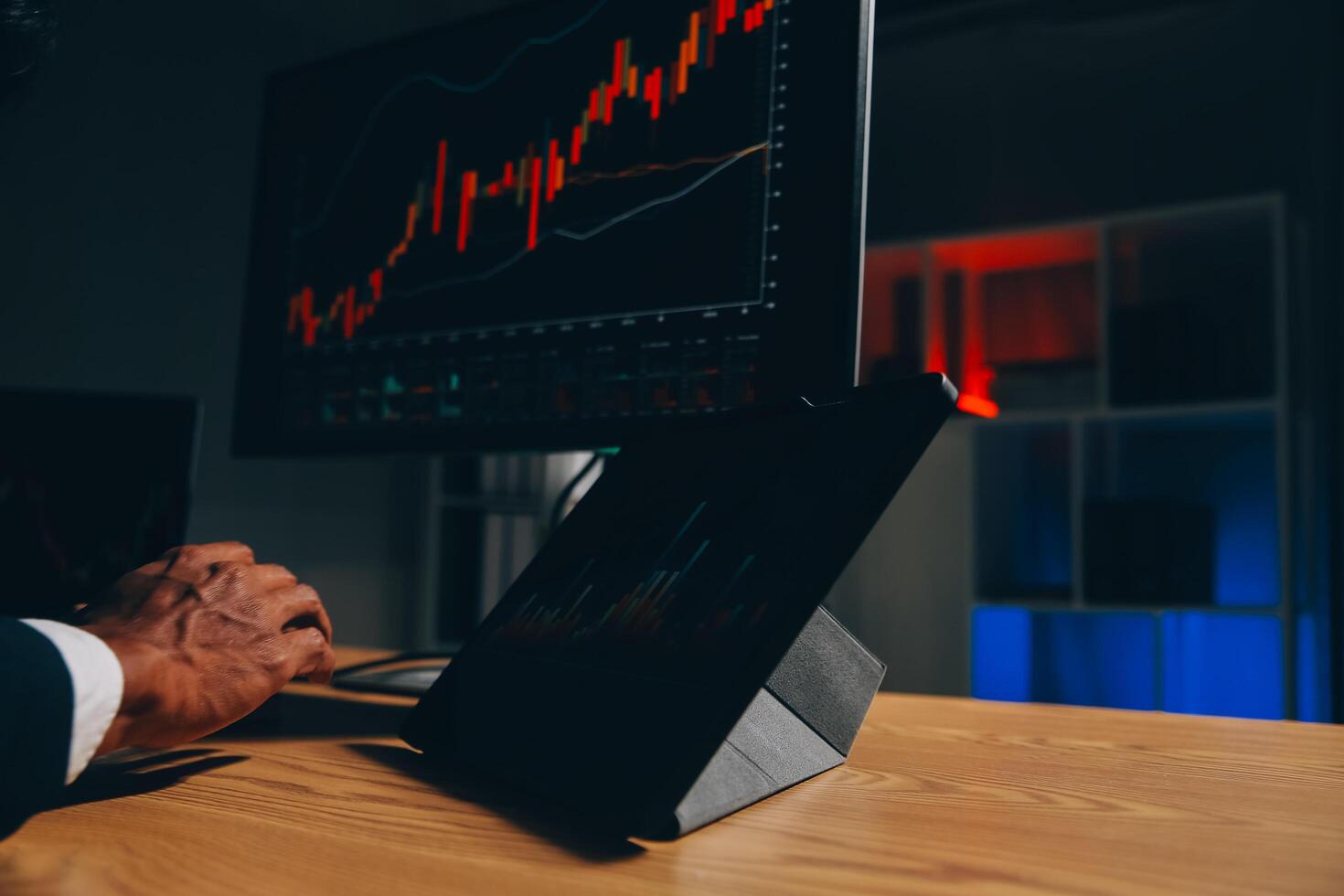 Thoughtful focused successful caucasian male stock investor, broker, financial adviser, sits at work desk, looks at computer, pensively analyze risks and prospects, rise or fall of cryptocurrency coin photo