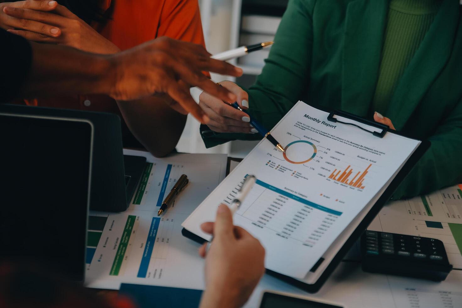 Co working conference, Business team meeting present, investor colleagues discussing new plan financial graph data on office table with laptop and digital tablet, Finance, accounting, investment. photo