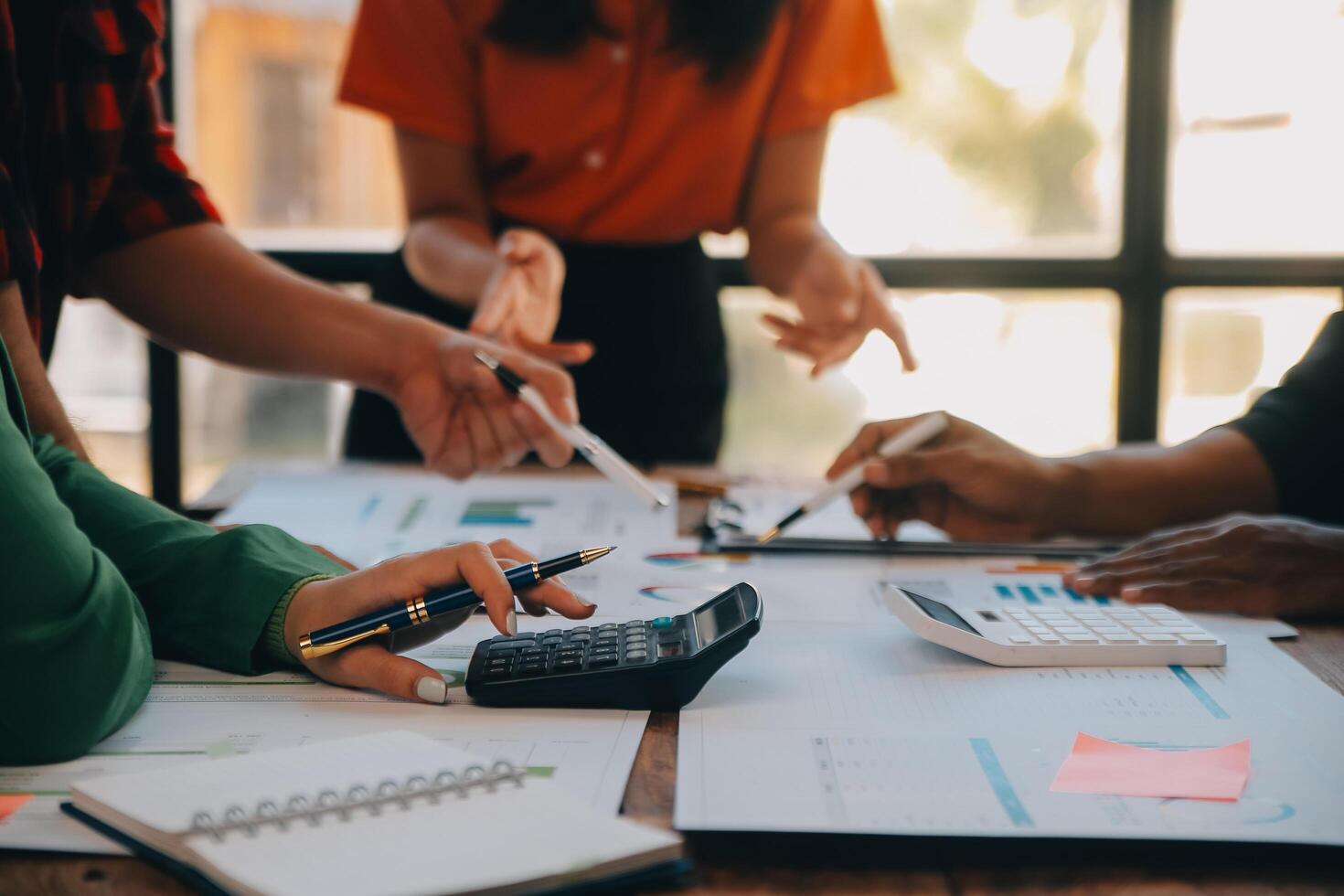 Co working conference, Business team meeting present, investor colleagues discussing new plan financial graph data on office table with laptop and digital tablet, Finance, accounting, investment. photo
