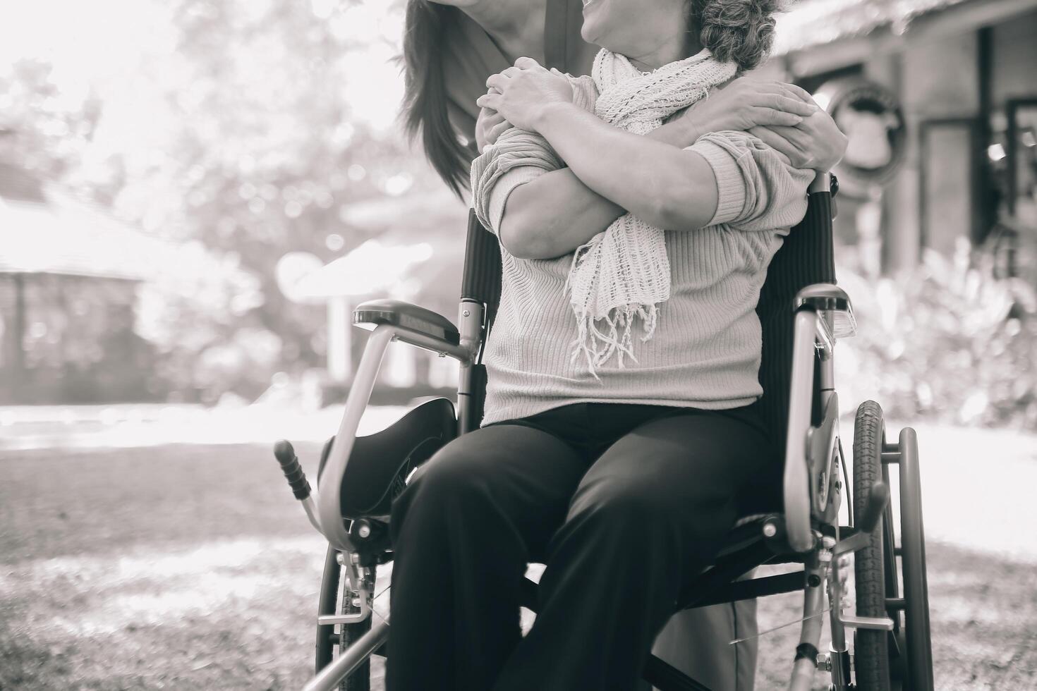 Young asian caretaker with 60s asia elderly woman consulting and encourage, take a history and recommend the right treatment to live happily in retirement, holding hands and encouraging photo