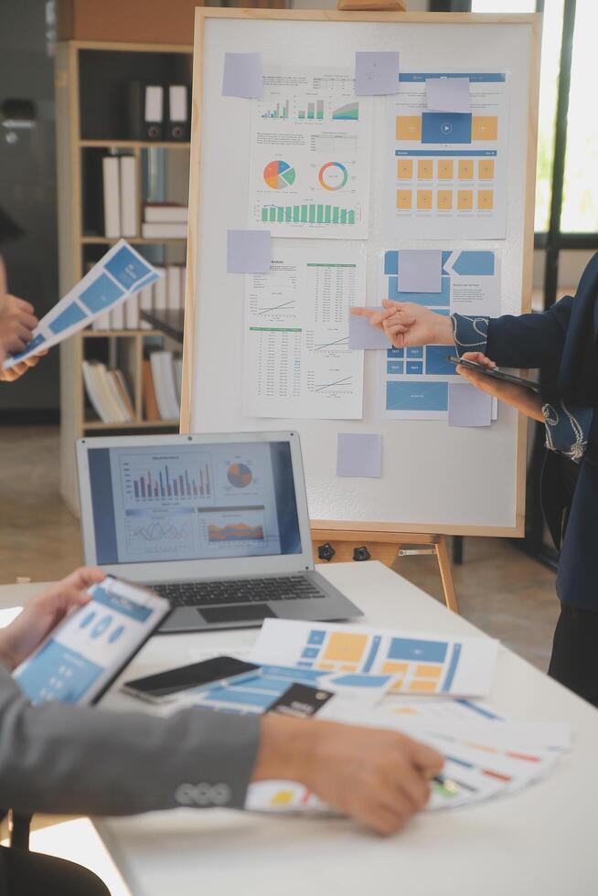 Close up ux developer and ui designer use augmented reality brainstorming about mobile app interface wireframe design on desk at modern office.Creative digital development agency photo