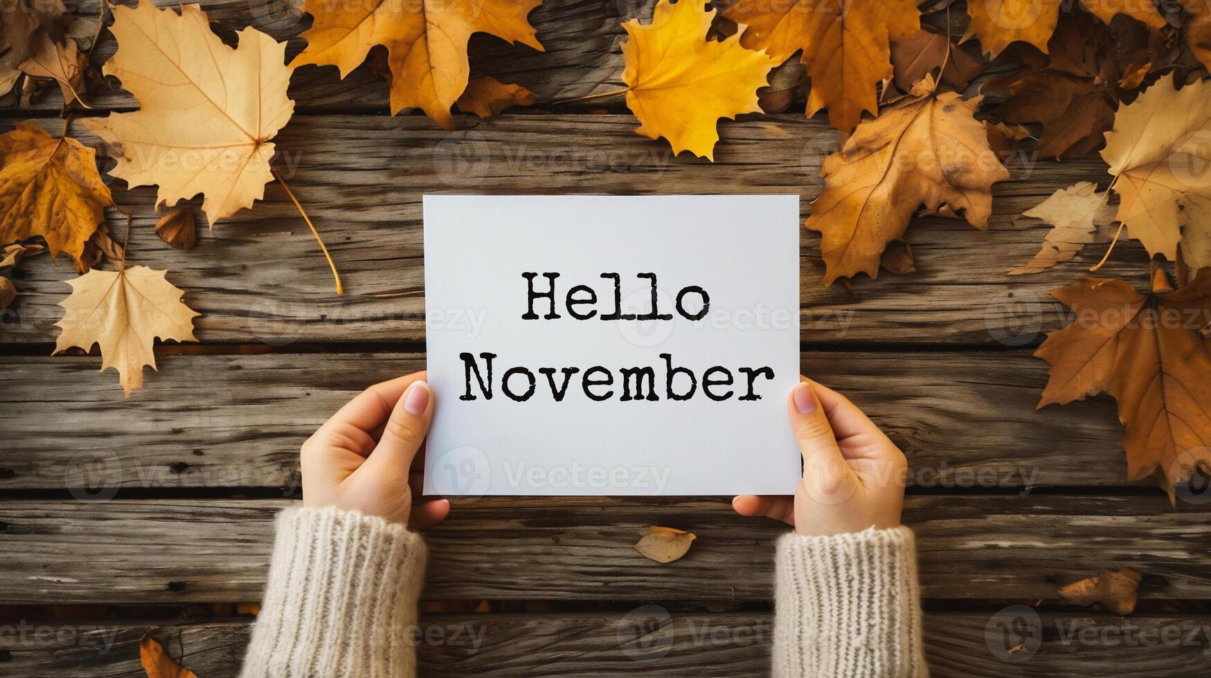 AI generated Hands holding sheet of paper with Hello November text on wooden background photo