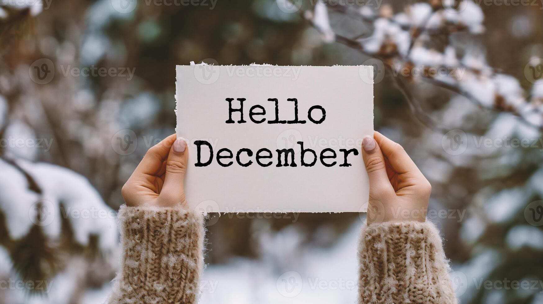 AI generated Hello December card in female hands on the background of the winter forest. photo