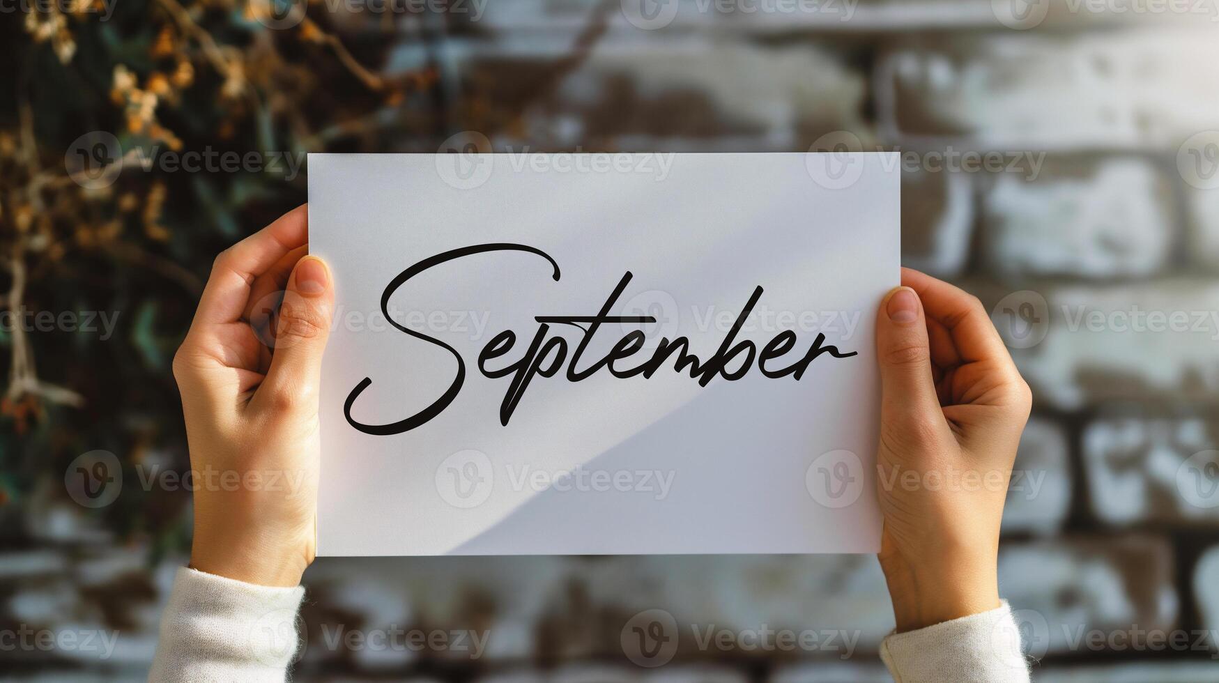 AI generated Woman holding a piece of paper with the word september. photo