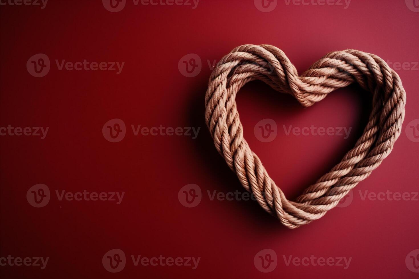 AI generated Heart made of rope on a red background. Valentines day concept. photo