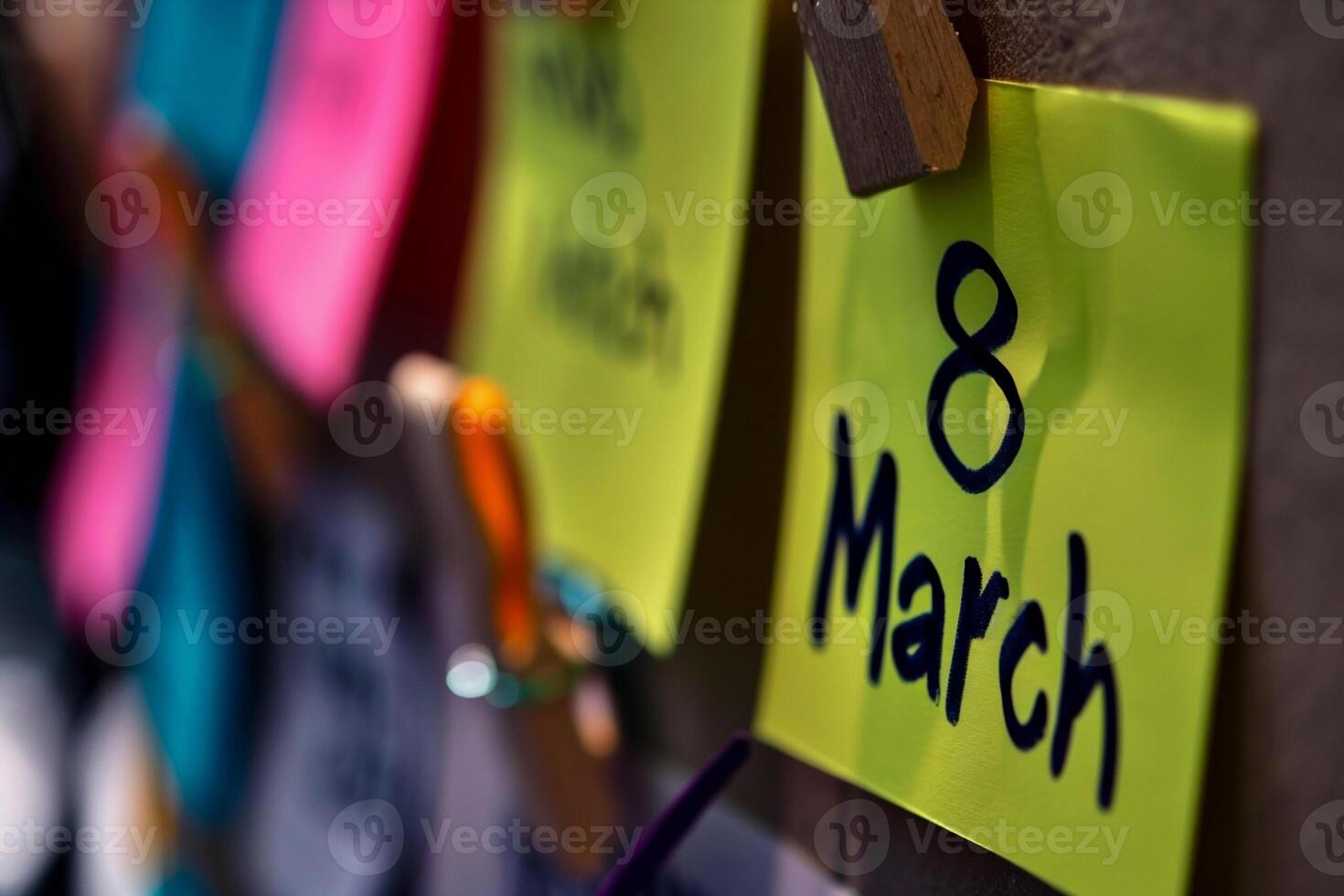 AI generated March 8, International Women's Day on colorful stickers hanging on the wall photo