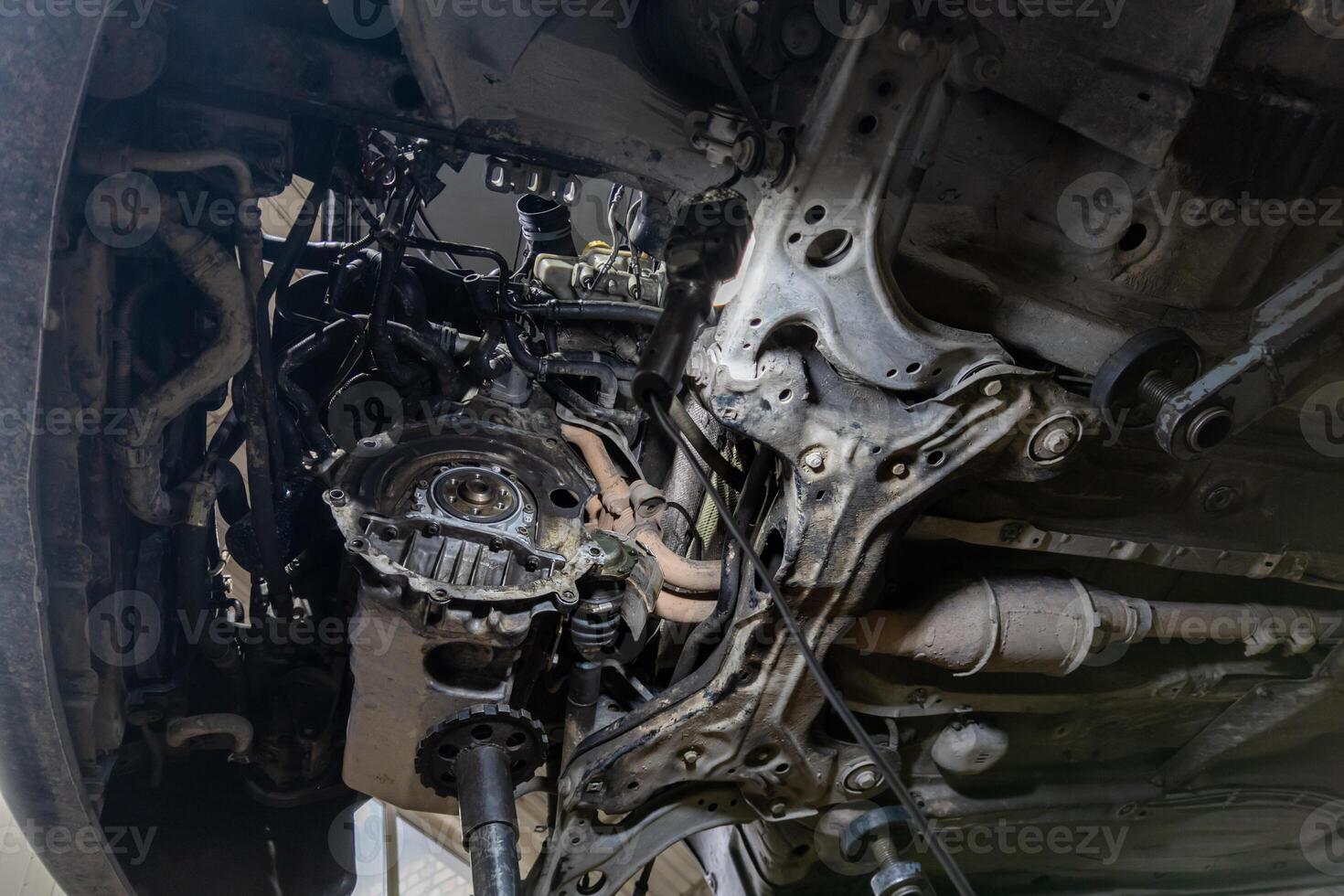 old German car engine bay with dismounted gearbox, view from below photo