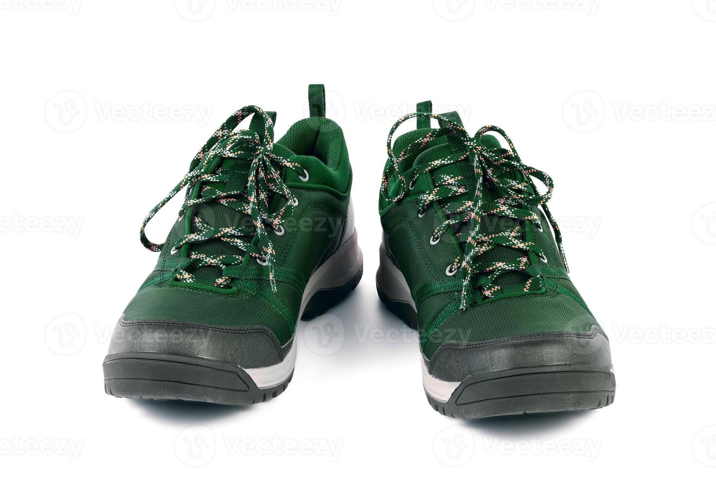 black and green outdoor empty lightweight waterproof breathable fabric sneakers isolated on white background photo