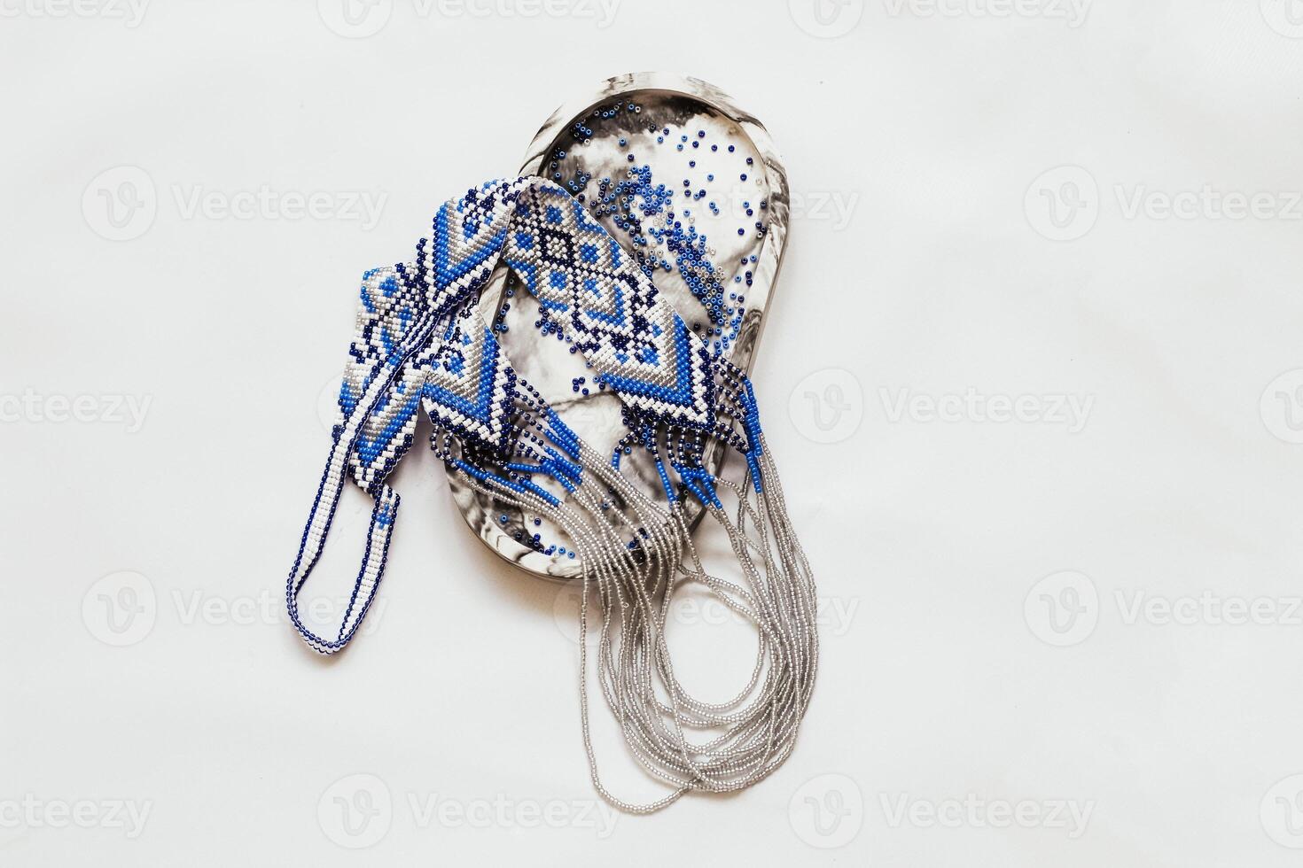 Geometric pattern on the gerdan ornament, Ukrainian beaded ornament, amulet. photo