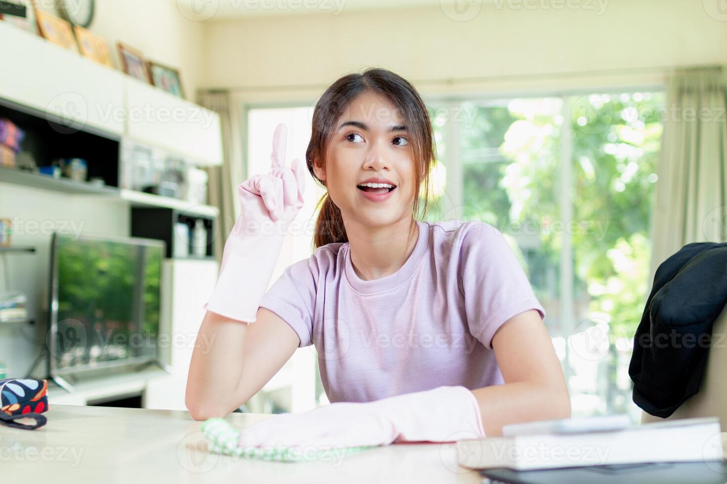 asian woman Clean on the living room, apartment or home area photo