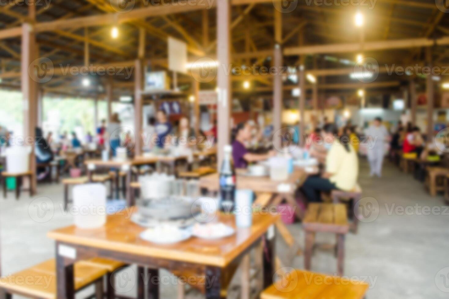 Blur restaurant with customers to access services. photo