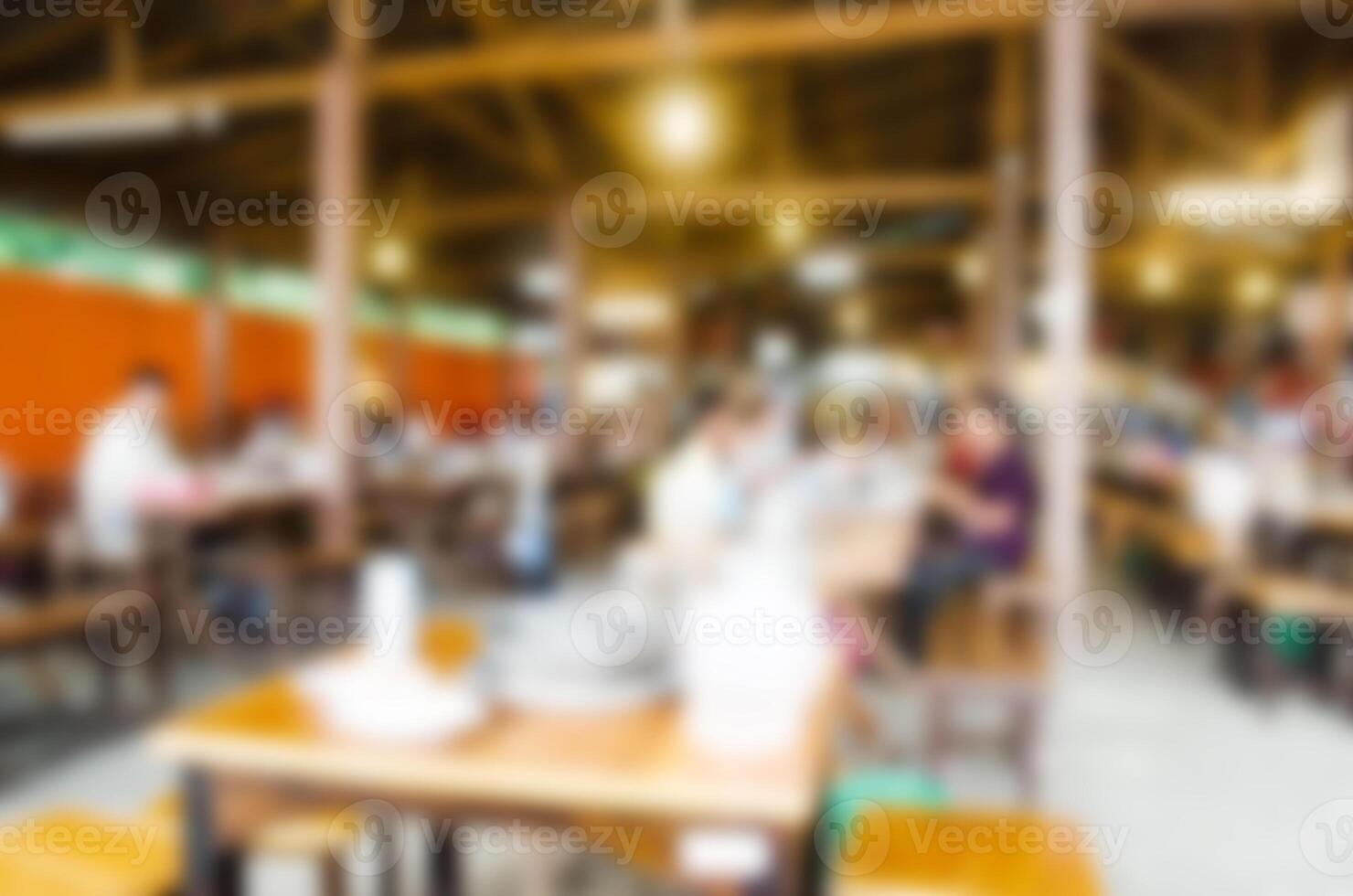 Blur restaurant with customers to access services. photo