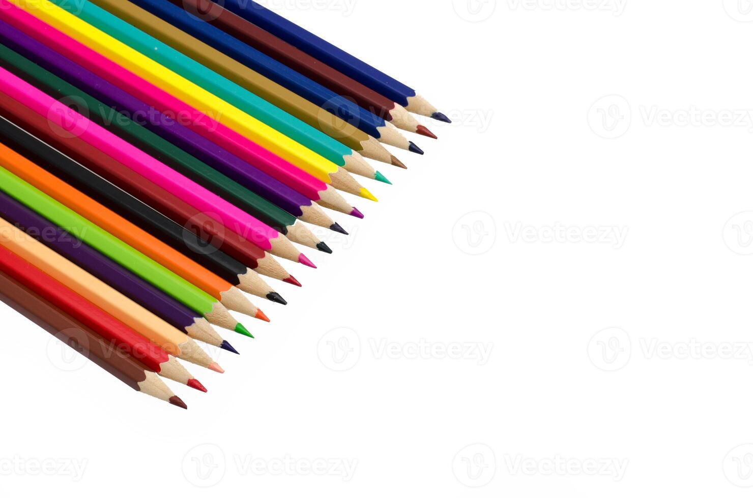 Colour pencils isolated on white background close up photo