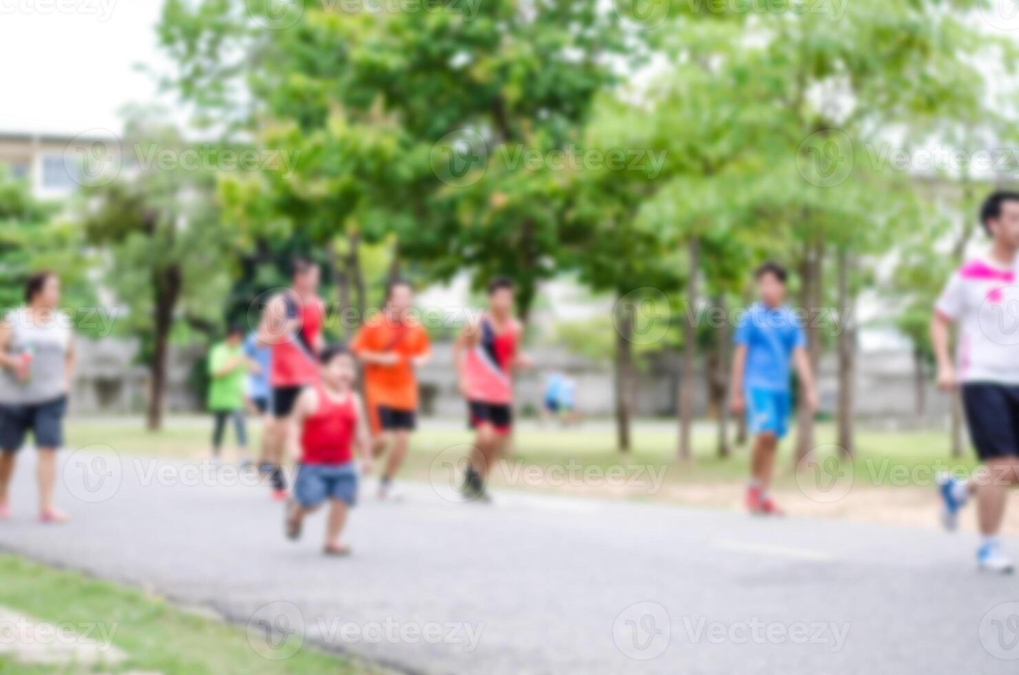 Blur people jogging in the stadium photo