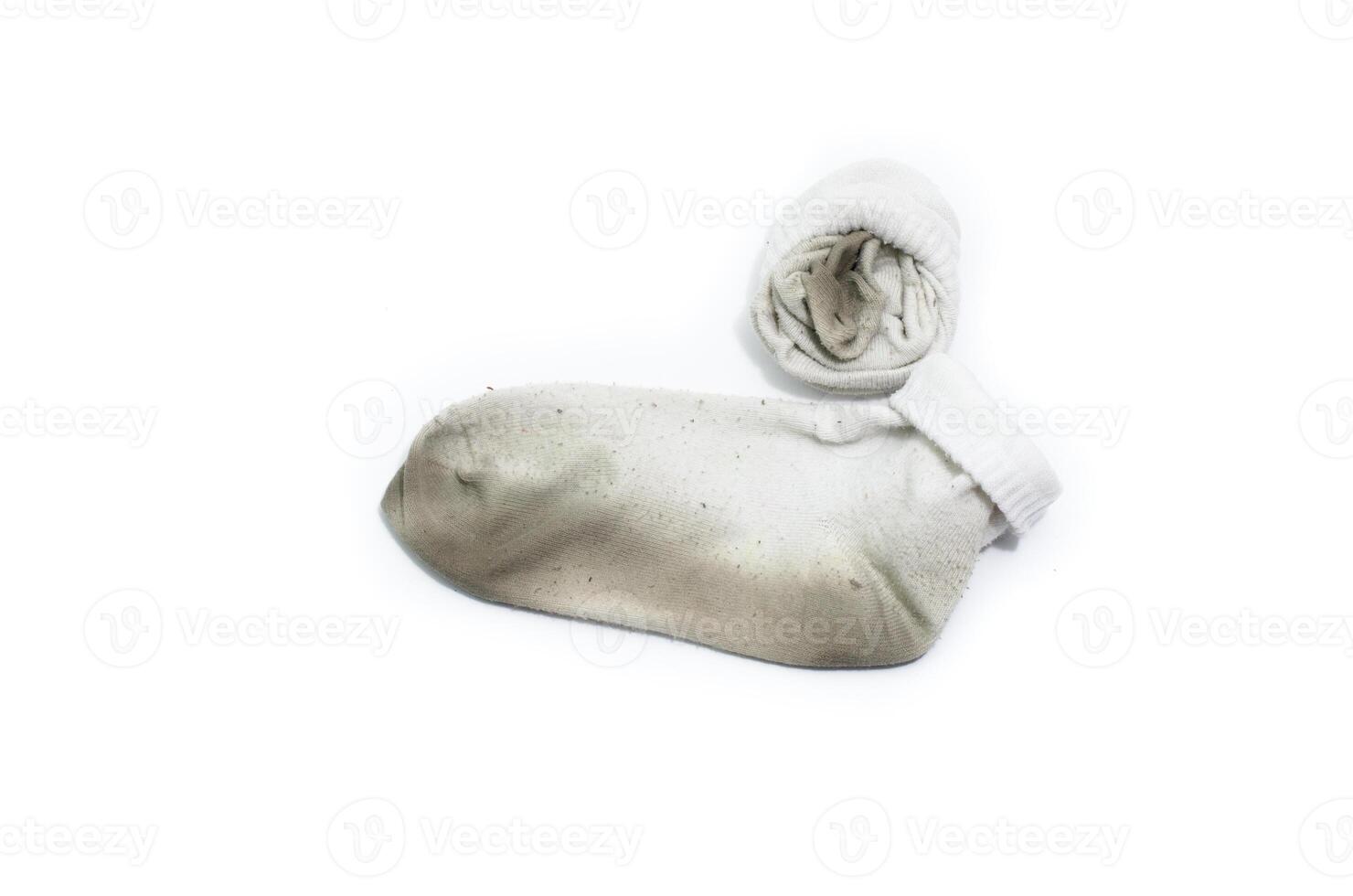 used dirty sock  on white background photo