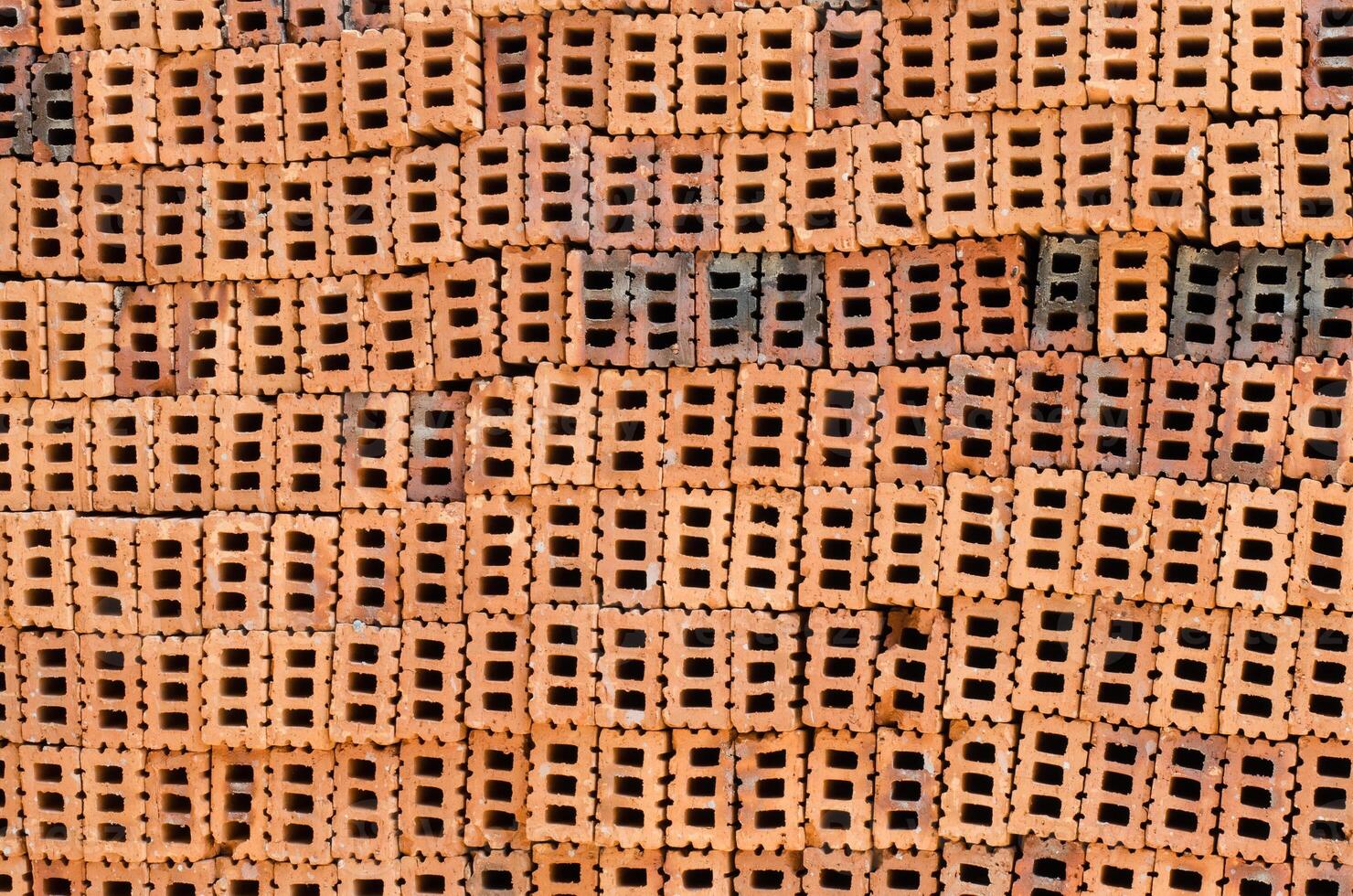 Orange bricks used in the construction photo