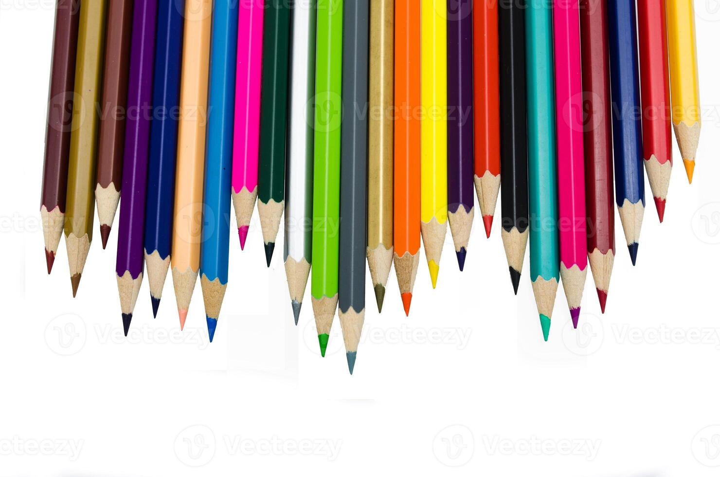 Colour pencils isolated on white background close up photo