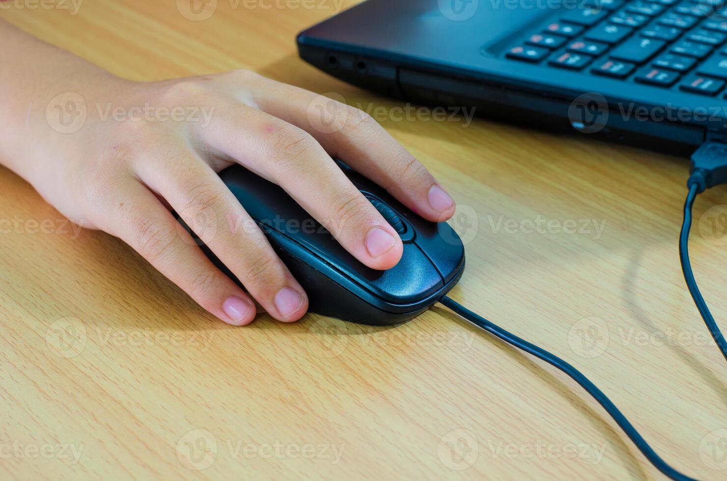 hands clicking computer mouse photo