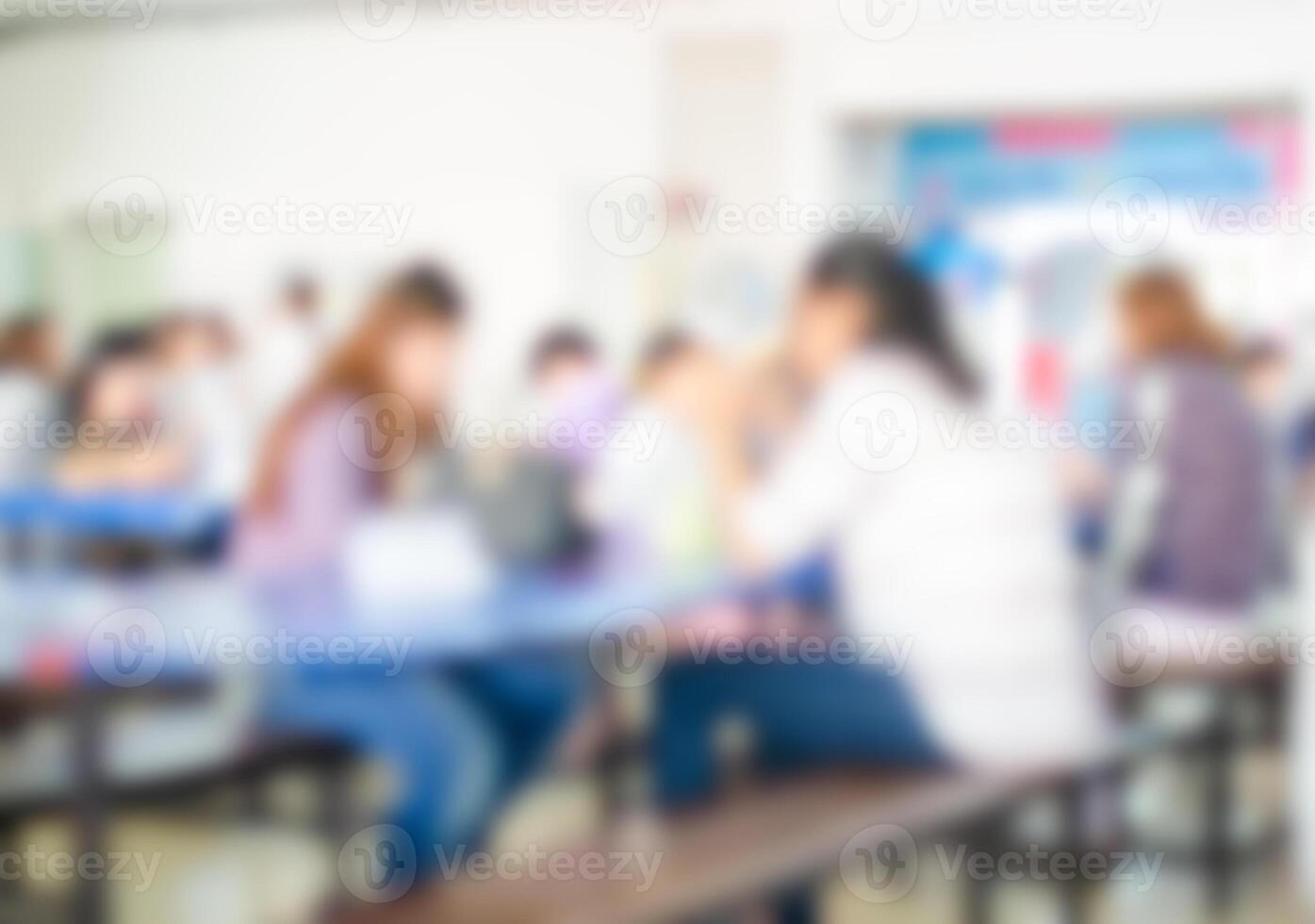 Blur image people enjoy different activities between meals in the cafeteria. photo