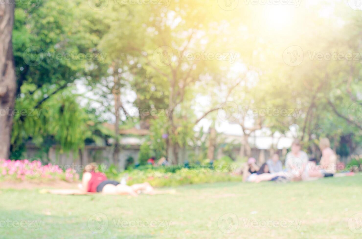 Blur people activities in the public park in morning photo