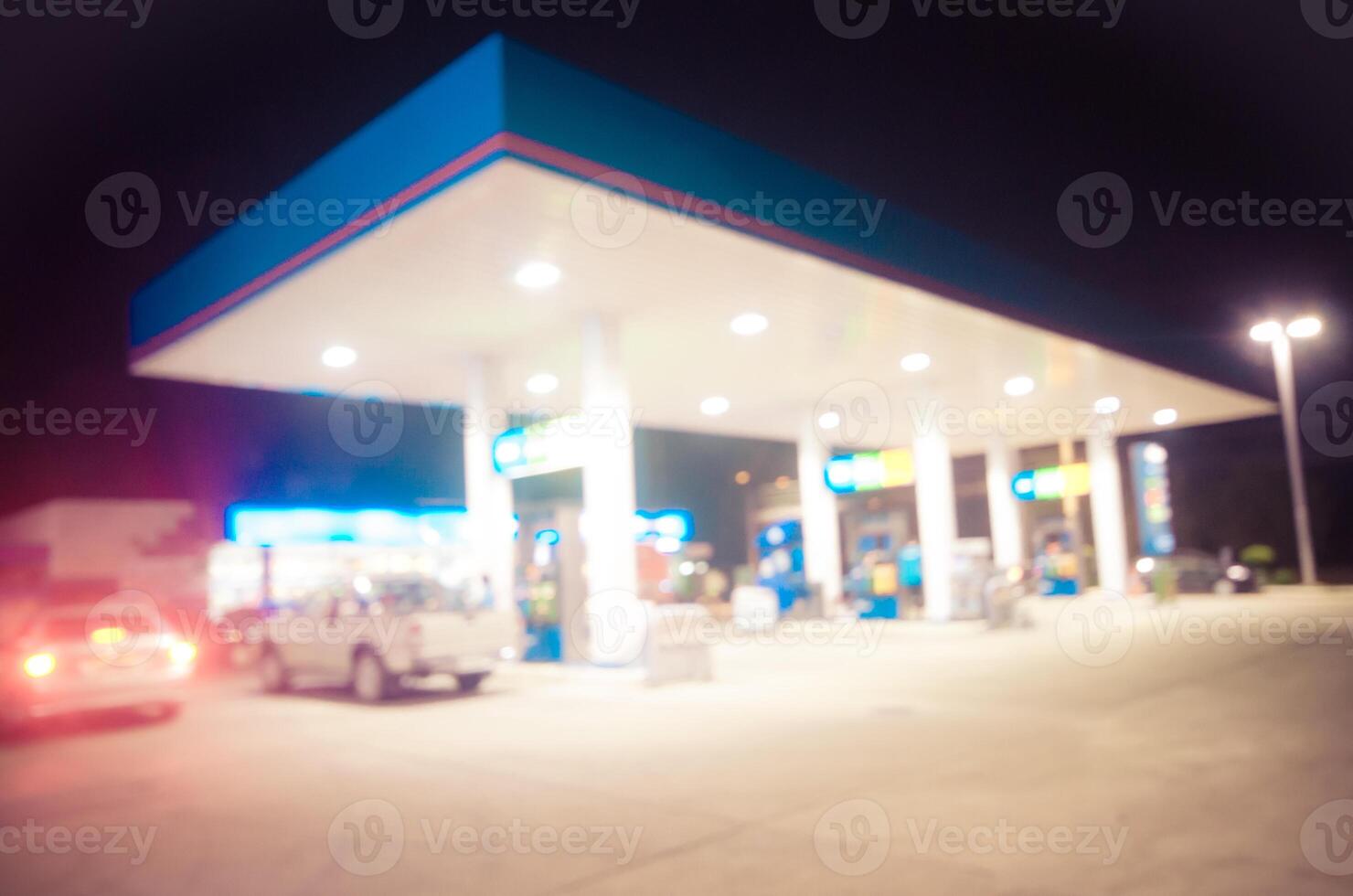 Blur lights, filling gas station at the night. photo