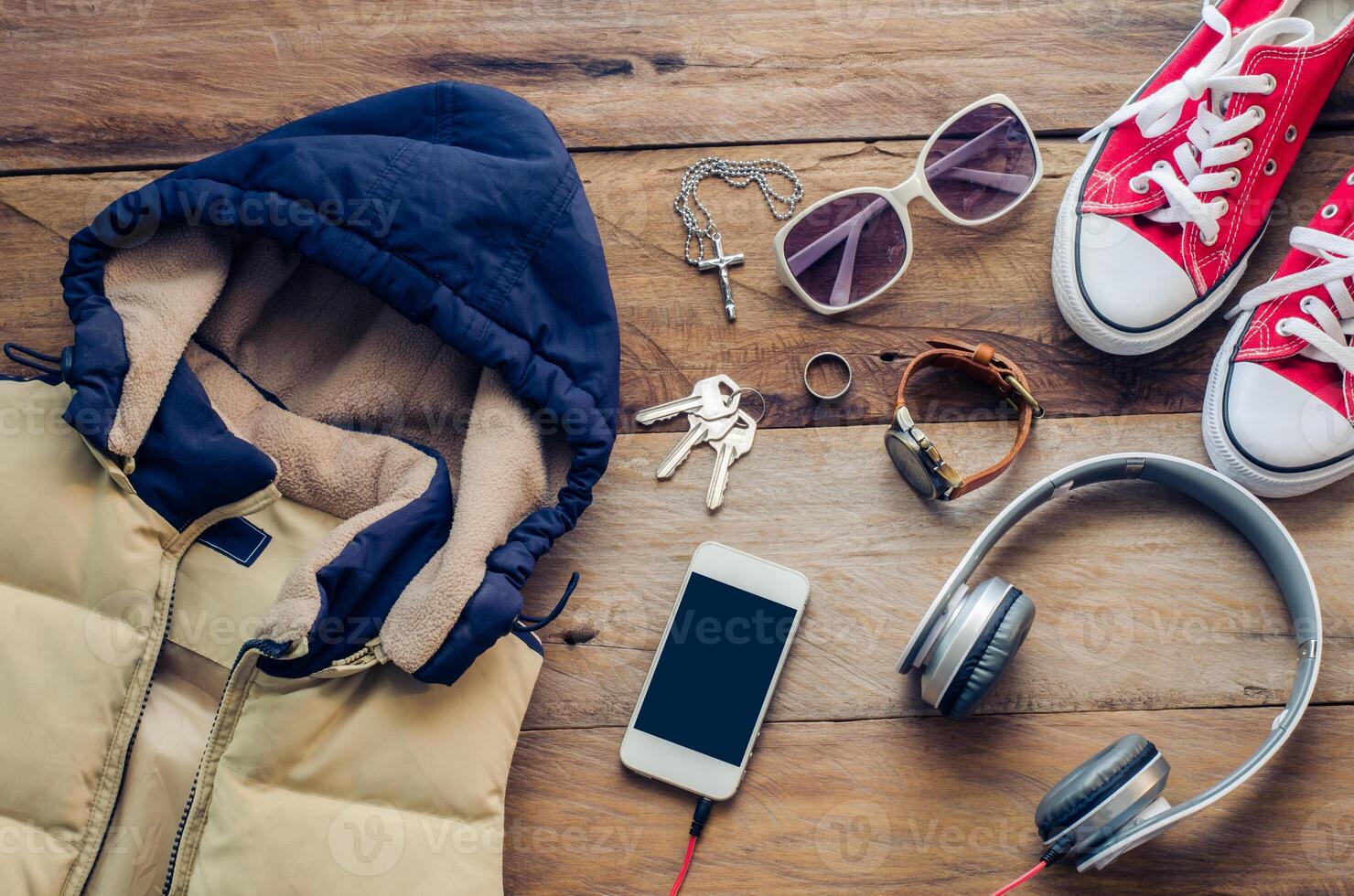 Travel Clothing accessories on wooden floor for the trip photo