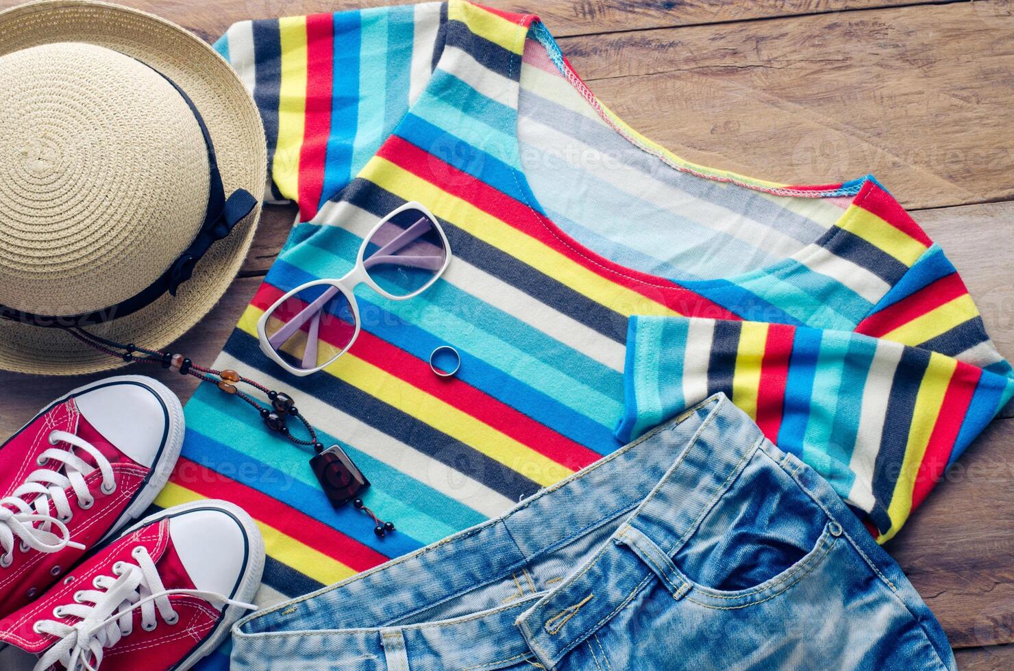 clothing for women, placed on a wooden floor. photo