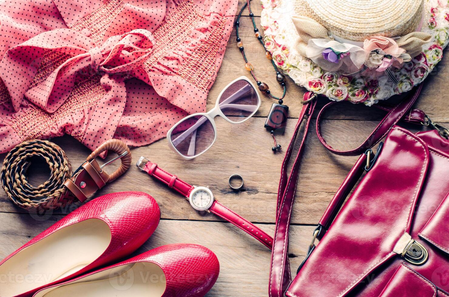 clothing for women, placed on a wooden floor. photo