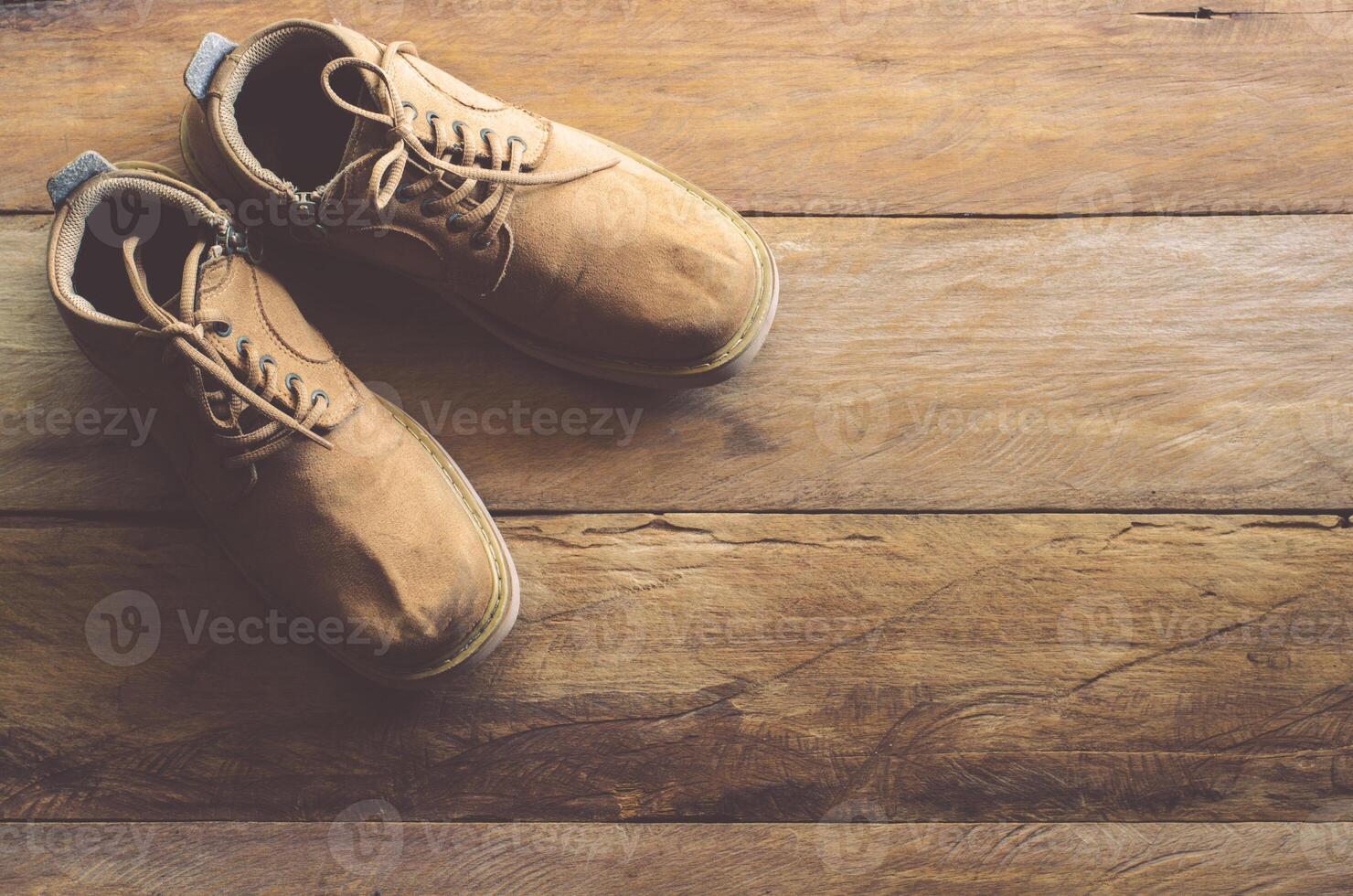 Leather shoes on the wooden floor. photo