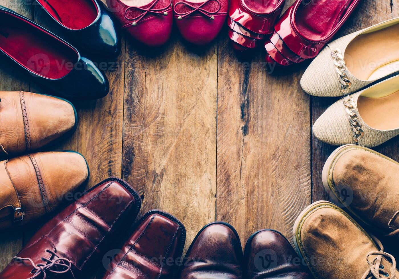 shoes with men and women various styles on a wooden floor - lifestyles. photo