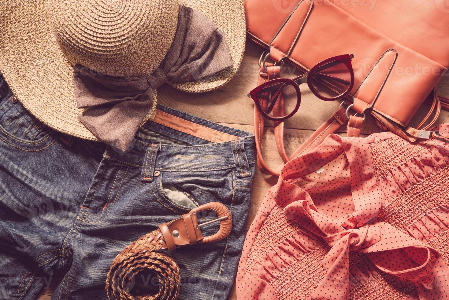 clothing for women, placed on a wooden floor. photo