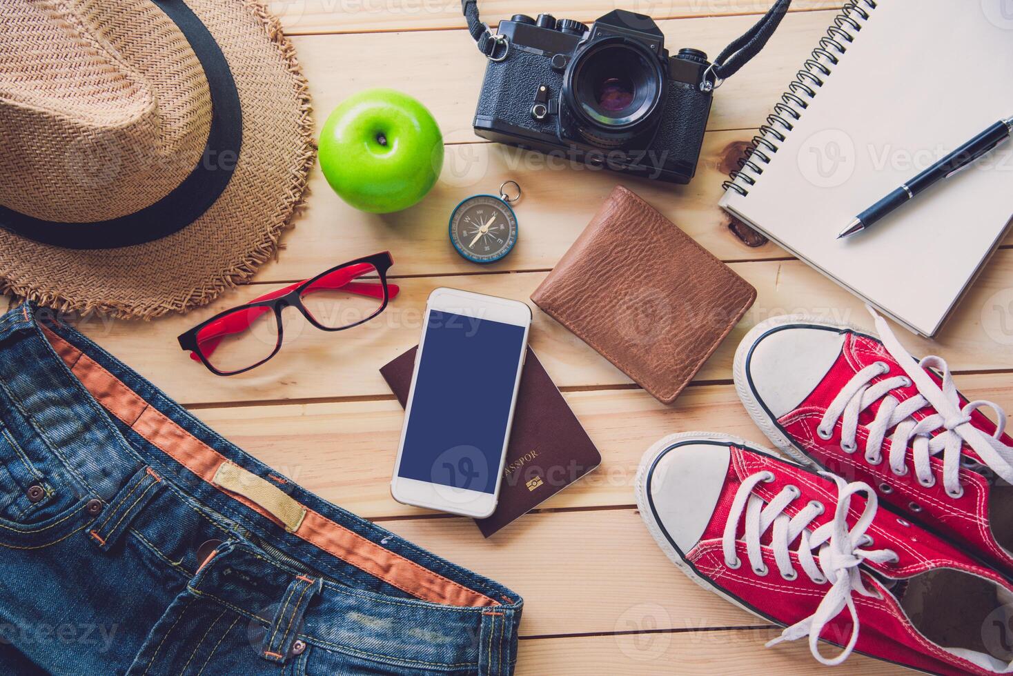 Travel accessories costumes. Passports, luggage, The cost of travel maps prepared for the trip photo