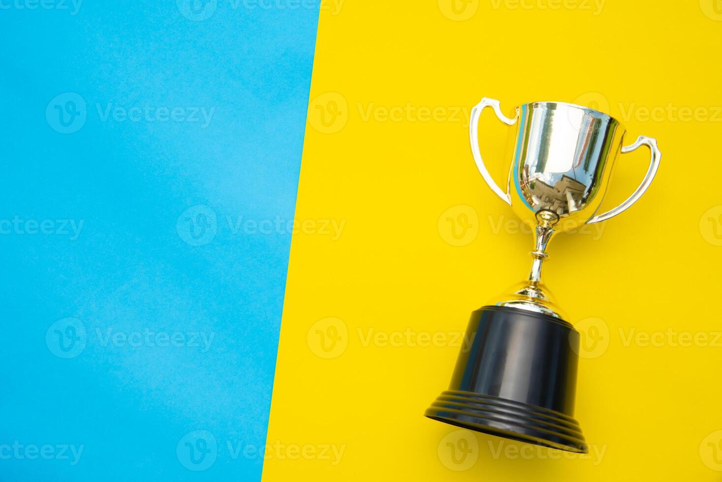 Top view for trophy placed on a colorful background. photo