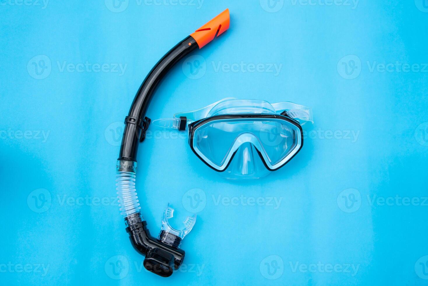 Diving Mask and Snorkel on wooden floor photo